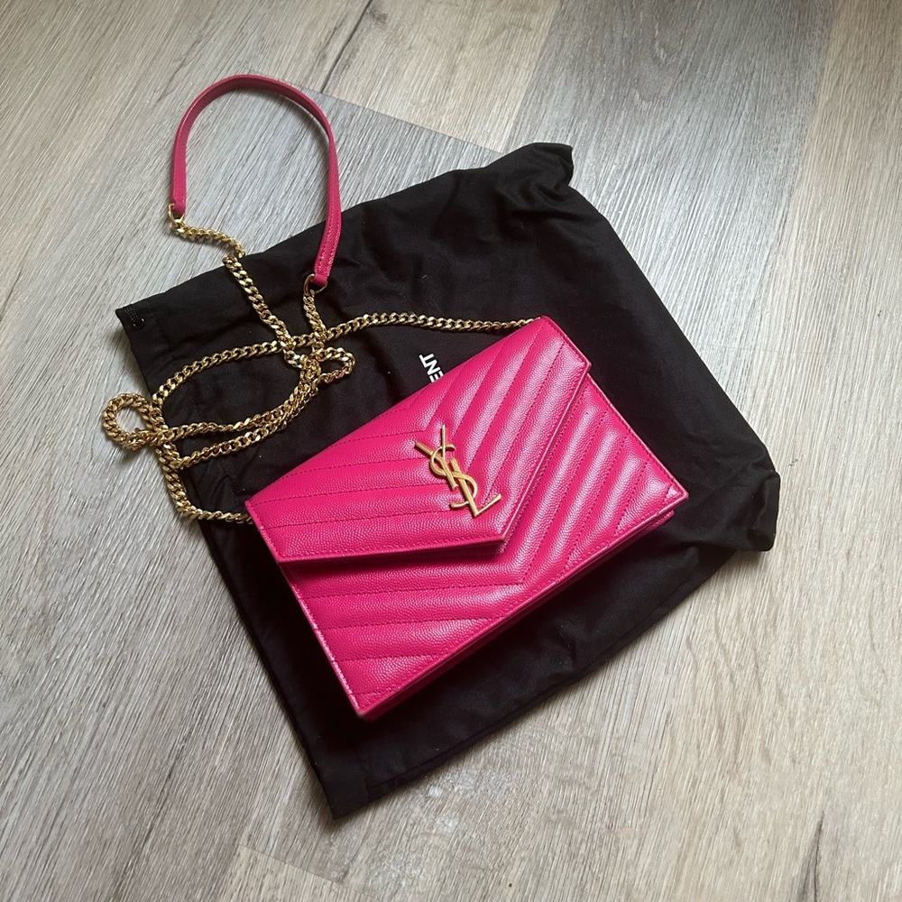 Saint Laurent wallet on the chain handbag.